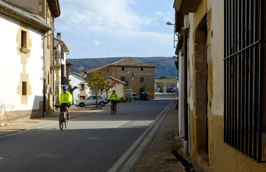 Cyclists in Uterga village